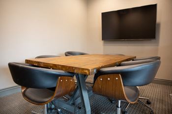 Business center with conference room and private work rooms